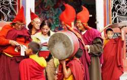 Helen Kampf with Monks in Labrang Monastery